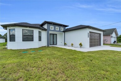 View of front of home featuring french doors, stuc
