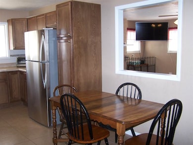 Pantry, Pass Through Window to Family Room