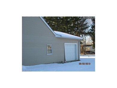Extra door on back of garage for easy access.