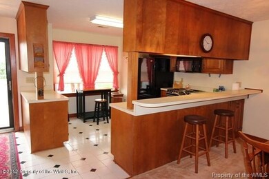 Kitchen with eat in bar