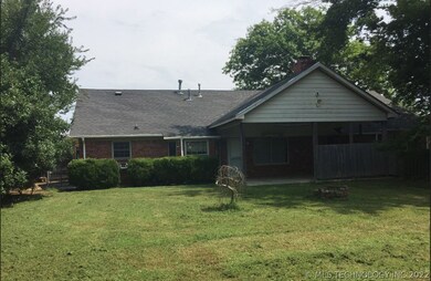 Rear View of Home with Large Covered Patio