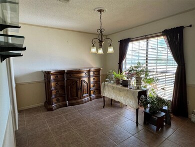 Dining room featuring an inviting chandelier.