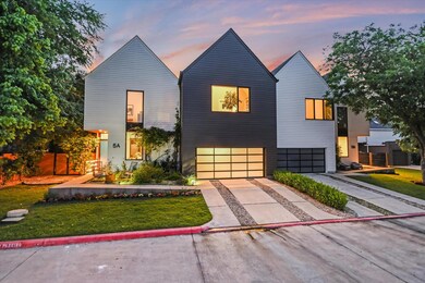 View of front of home featuring a garage, drivewa