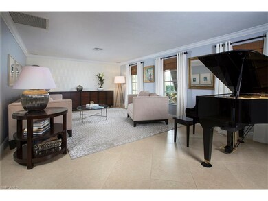 Crown molding and tile on the diagonal throughout 