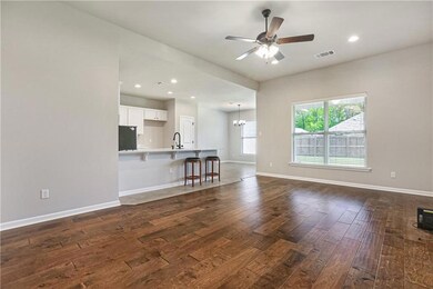 Open floor plan with gorgeous wood floors that loo