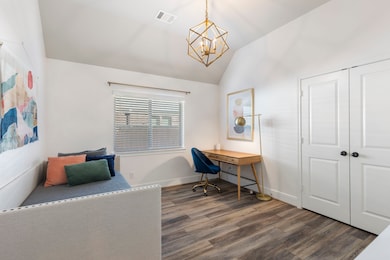 Another secondary bedroom. Notice the modern light fixture. This bedroom connects directly to the secondary Hollywood bathroom.