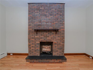 Beautiful and stately fireplace is the focal point