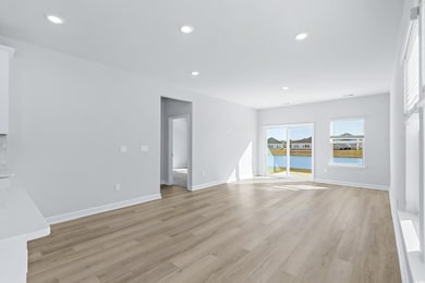 Unfurnished living room with light wood-type floor