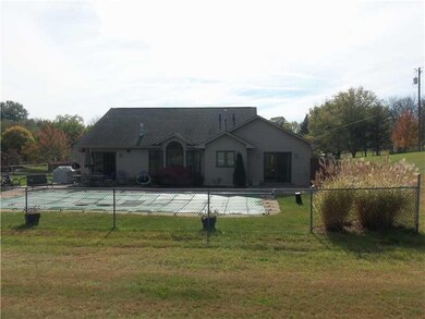 Exterior Back. Level Rear Yard - Concrete Patio/He