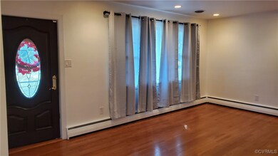 Entryway with hard wood flooring