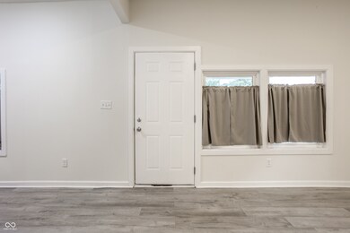 Front Door and Living Room