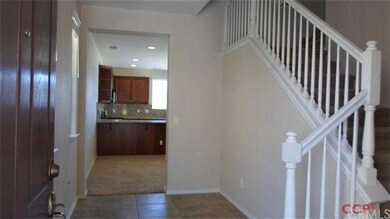 Enter in large foyer with tile floors
