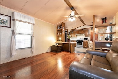 Living room with light wood finished floors and ce