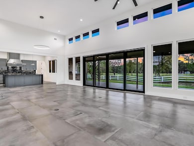 Unfurnished living room featuring recessed lightin