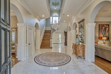 From the moment you walk in the door, this home exudes nostalgia and elegance. With gleaming marble floors, warm hardwoods, sparkling chandelier and soft paint finishes throughout, the beauty of this home resonates for the ages!