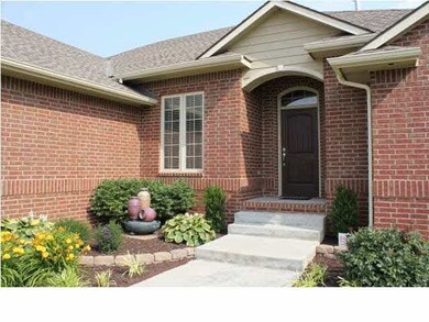 Landscaping all around home, calming fountain at y