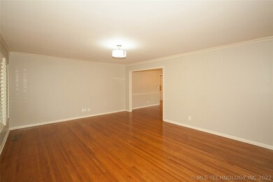 Living room open to dining room