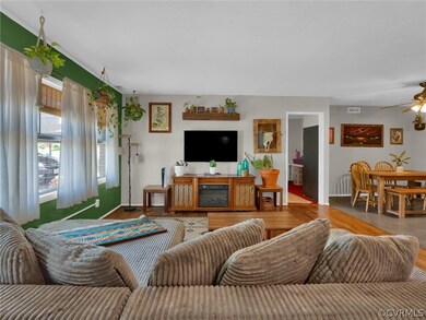 Living room featuring wood-type flooring and ceili