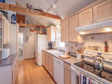 The kitchen is modern and bright...