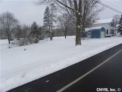 Land. Home sits on 0.77 Acres with mature trees