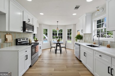 VIRTUALLY STAGED PHOTO MAY CONTAIN FIXTURES & ITEMS NOT INCLUDED IN HOME.