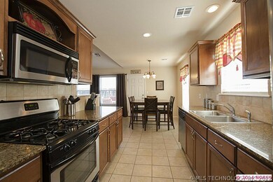 View from Kitchen into Dining Area.