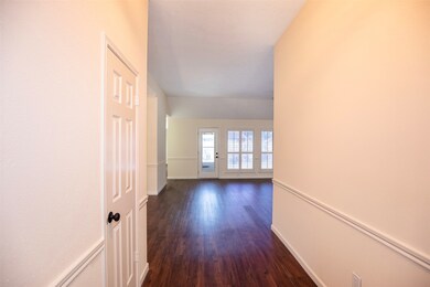 A view of the entryway looking to the family room.