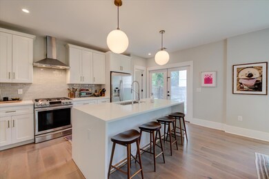 Kitchen featuring appliances with stainless steel