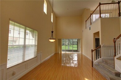 Dining Room and Great Room with 20 ft ceilings and