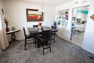 Formal Dining w/ glass pass-through