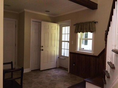 This doorway opens to a quiet grassy...