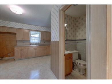 Half Bath between Family Room and Kitchen