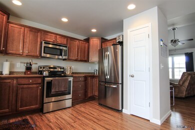 Stainless upgrade in kitchen with pantry closet
