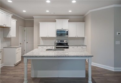 Photo of Georgian Townhome Plan Currently under co