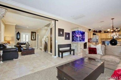 The parlor room and living room combine to create 