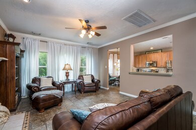 Large living room open to kitchen! (has been repainted light Grey)