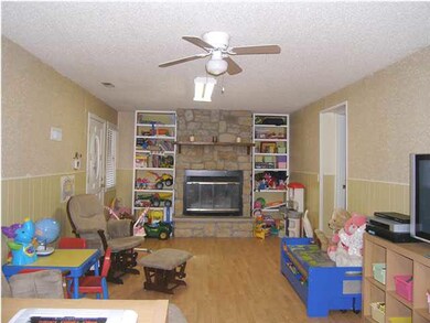 THE FAMILY ROOM AS SEEN FROM THE ENTRY INTO THE DI