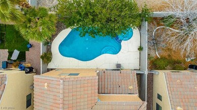Birds eye view of your sparkling pool and cool dec