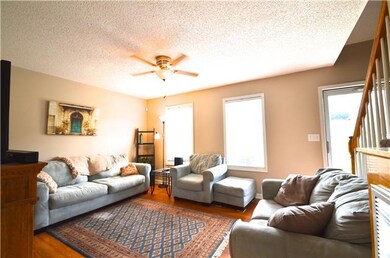 ANOTHER VIEW OF THE BEAUTIFUL LIVING ROOM