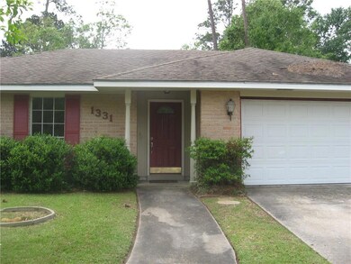 Front porch and double garage