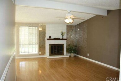 Spacious Living Room features Open Beam Ceilings a