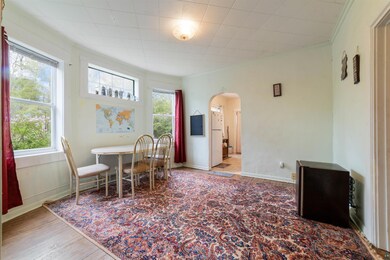Dining room with a healthy amount of sunlight, har