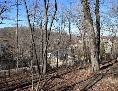 Great location for a walkout basement custom home offering seasonal lake views.