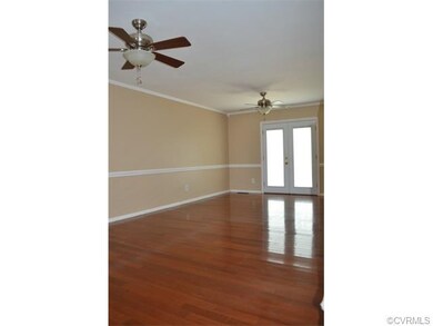 Living Room view 1. Hardwood floors, 2 CF, Chair R