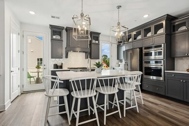 Kitchen with glass upper cabinets