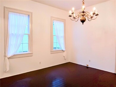 This room adjoins the living room. It has a full b