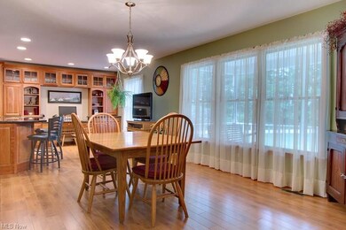 The formal dining area has large windows overlooki