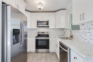 Kitchen View with ceramic wood tile Flooring