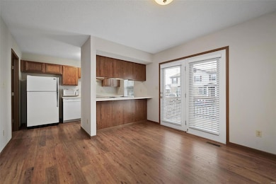 Kitchen & Breakfast area with door leading to deck