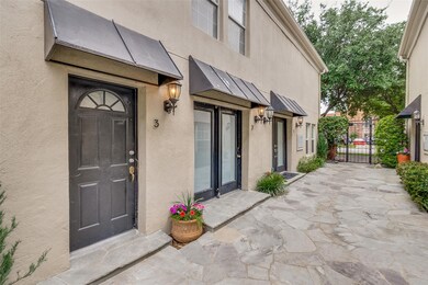Property entrance with a patio area